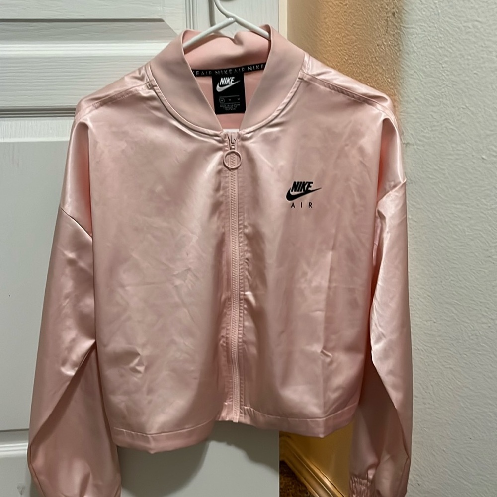 women’s Nike Air pink silk jacket .